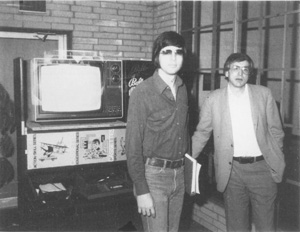 Picture: Brett Bilbrey and Ken Charles, of Astrovision, looking at a display of the new 'Demolition Derby' cartridge, still under development.